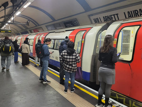 A Northern Line train stopping at Camden Town station