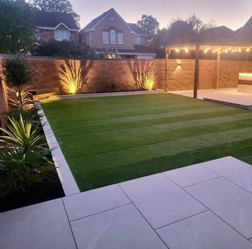 Freshly landscaped garden with artificial lawn.