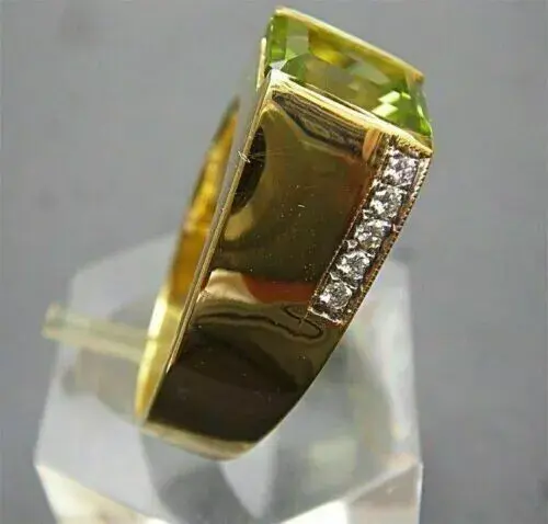 Thumbnail: Emerald Cut Lab-Created Peridot Men's Wedding Ring 14K Yellow Gold Micron