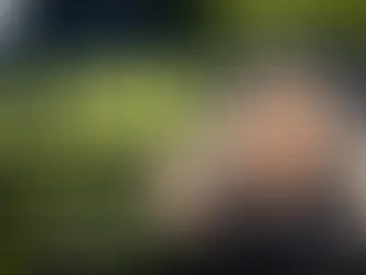 Man holding head in distress against a digital background. Text reads AI Laws: Hidden Dangers. Notable text: Read This. Trending Now.