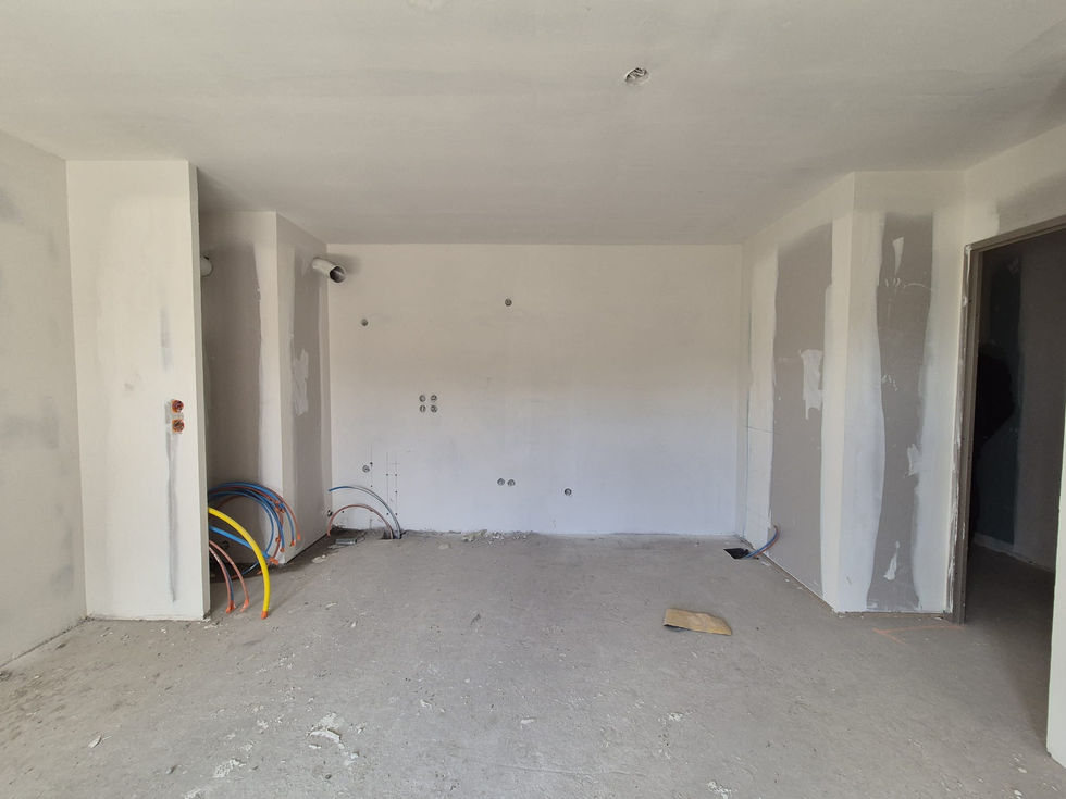 photo travaux mur béton enduit