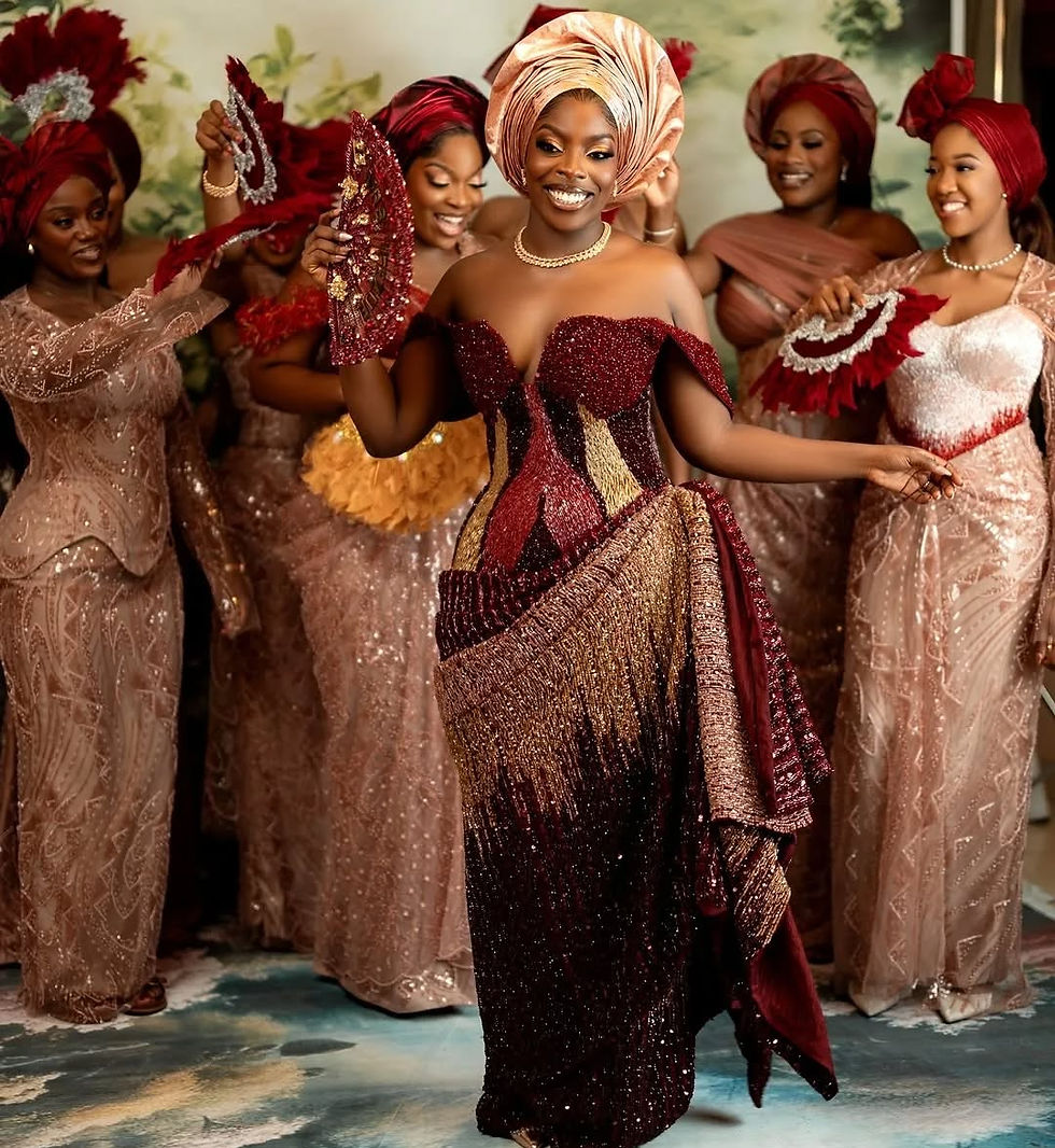 Nigerian bride dancing with her asoebi bridesmaids for her traditional Nigerian wedding