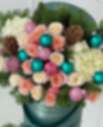 flower arrangement with Christmas ornaments