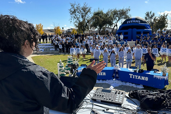 A. Torres Directing In the Huddle.JPG