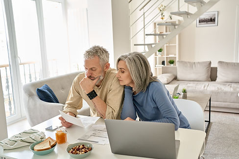 worried-old-senior-couple-checking-bank-documents-2021-09-02-15-11-21-utc.jpg