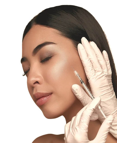 Woman receiving facial injection treatment