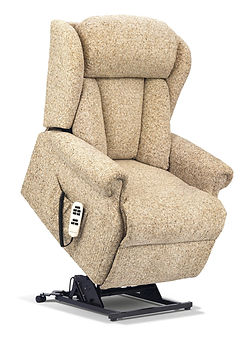 Cartmel riser recliner with scroll arms, supportive back and powered leg rest.