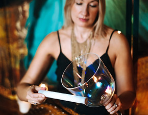 Nicky playing handheld crystal bowl