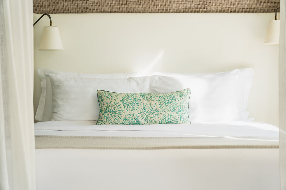 white-comfortable-pillow-bed-decoration-interior.jpg