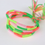 Miniatura: pulsera tejida de varios gusanitos neones en amarillo, verde y naranja de lado