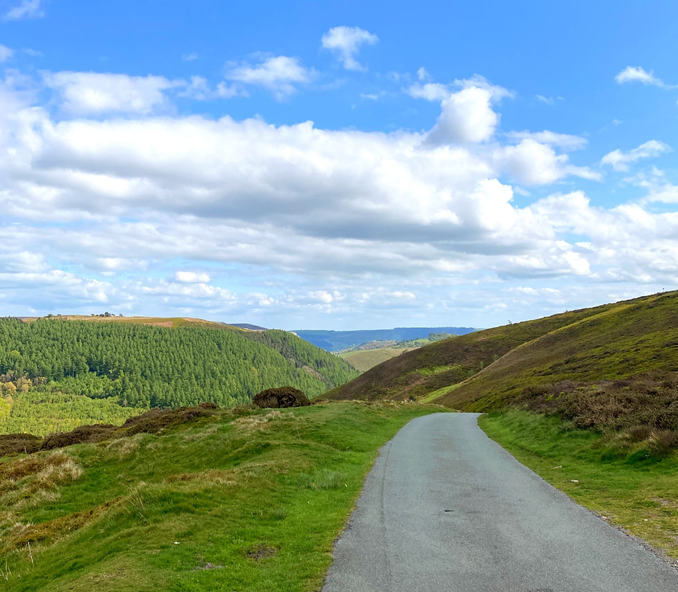 road with countryside either side 