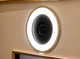 Close-up of the professional DSLR camera and integrated ring light inside a luxury enclosed photo booth. The high-quality camera system is designed to capture sharp, flattering photos with even lighting, delivering studio-quality photo booth images for weddings, corporate events, and special occasions in Vancouver.