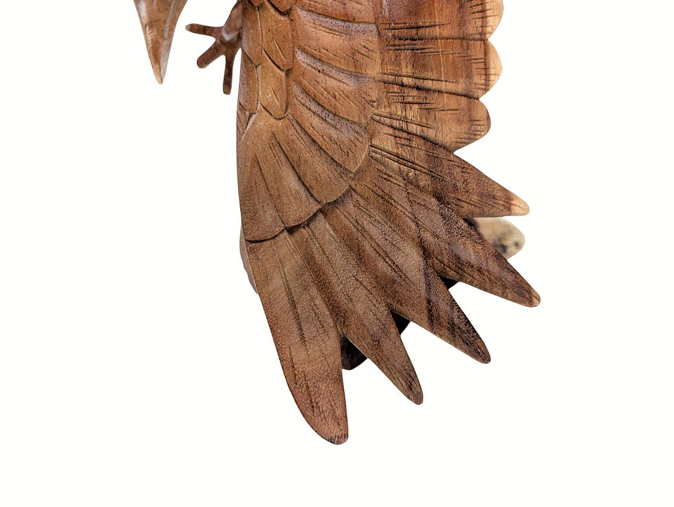 Thumbnail: Hand-carved wildlife statue with detailed wings tail feathers and talons