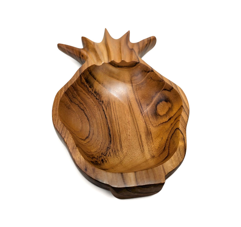 Artisan-crafted teak fruit bowl shaped like a pineapple