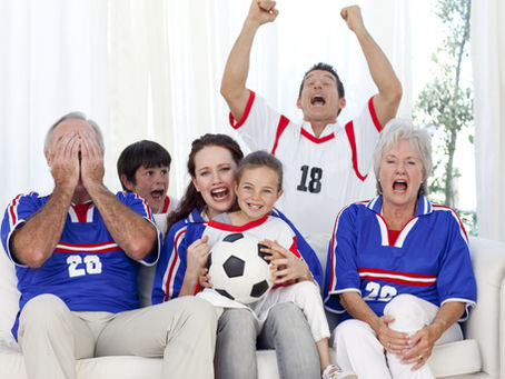 Multi-generational family cheering