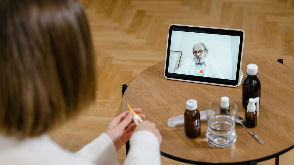 A doctor provides an online consultation via video call on a tablet, seen on a wooden table.