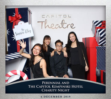 A group of people posing for a photo at a Capitol Kempinski event in Singaopore

Photo by: Pop Illusion