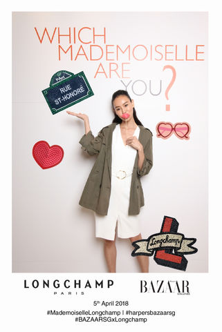 A lady posing for a longchamp  sticker photo booth in Singapore

A lady posing for a light art singapore photo booth

Photo by: Pop Illusion