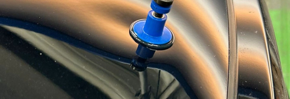 Tab hot glued inside of dent