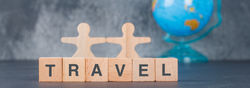 conceptual-of-travel-with-wooden-blocks-with-wooden-human-figures-globe_edited