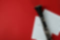 clarinet-and-musical-notes-on-red-background-2026-03-25-01-42-19-utc (1).jpg