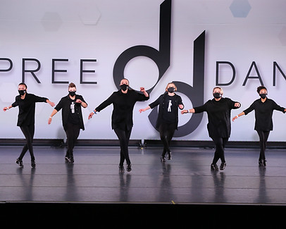 Converge tap company performing at competition.