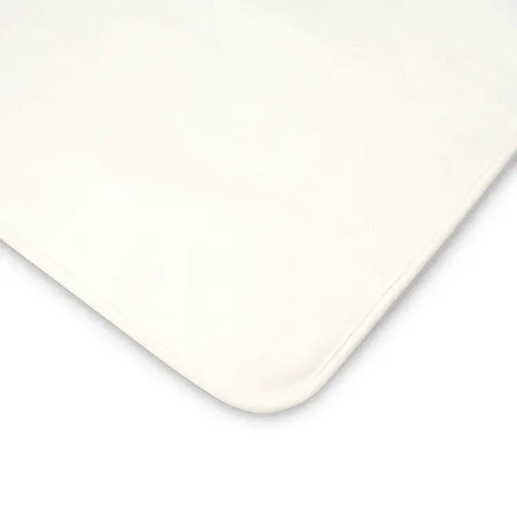 Miniatura: Detalle del cubre colchón impermeable con ajuste elástico, perfecto para colchones de cuna y camas de bebé.