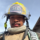 By Ty Walker, The Mountain Times It’s official. Orlando Cryer has joined the ranks of the Hoodland Fire District as a volunteer firefighter. He and his fellow classmates were sworn in and received their badges from the recruit academy at a special graduation ceremony on March 10 at the fire station.. Training started in the fall with a field of more than 20 prospects, 11 of whom earned their badges after completing a challenging course of studies and physical exercises. “I really liked the training.” Cryer said. “It was really tough. We learned a little bit about a whole lot of stuff.” Stuff like hooking up hoses and fire hydrants, throwing ladders, and riding in rigs. Physical training is nothing new to Cryer, who likes to spend his spare time sweating in the gym doing high-intensity workouts. “I’m looking to compete in Hyrox or CrossFit,” Cryer said. “I do a lot of CrossFit and Olympic weightlifting in my off time. I do a lot of clean and jerks and snatches. If I’m not at work or training, or thinking about school, I’m in the gym.” CrossFit is high-intensity interval training, also known as ‘hit’ workouts. It involves a lot of full body workouts. “It’s a really niche and small community,” he said. “Not a lot of people do Olympic weight lifting. To me it’s really fun. It’s one of the most efficient workouts you can do.” Having the ability to help people in emergencies is Cryer’s main inspiration for wanting to become a firefighter and EMT. He especially likes the spirit of camaraderie the firefighting community fosters. The physical aspect of the job appeals to him as well, making it a natural fit. Cryer aims to balance his full time job driving an ambulance at Clackamas County AMR with his volunteering duties at Hoodland Fire District, flip flopping between firefighting and transporting. Sometimes he drives, sometimes he rides in the back, attending to the patients. “I’m an EMT right now, working on basic life support, one step lower than a paramedic,” he said. He got his start in the medical field working at an outpatient cardiology clinic at OHSU in 2024. His eyes are set on becoming a career firefighter paramedic. “Whether that’s still at AMR and volunteering my time, or with a career department – working with Clackamas County is my dream,” he said. Being a firefighter is an inherently dangerous job. Protecting himself was one of the most important things he learned in training. Cryer was surprised to learn how many cancers are associated with firefighting. “There are many carcinogens in the everyday life of a firefighter,” he said. “We get a lot of medical calls, lots of contamination happens. You’ve got to be careful and make sure personal protective equipment (PPE) is on correctly.” “Probably the biggest thing you learn at firefighting academy is to protect yourself at all times. Making sure you have a good seal so you don’t breathe in any carcinogens.” When he’s not at work or in the gym pumping iron, you might find Cryer hiking on the mountain. He’s planning some backpacking trips for this summer. Cryer, 27, currently lives between Portland and Gresham, but he and his three cats are looking to move to Sandy to be closer to his new volunteer job Hoodland Fire Station “Do you know what’s better than two cats?” he said. “It’s three cats.” About 30 volunteers are on staff at Hoodland Fire District. Working side by side with 12 full time career firefighters, they are the backbone of the Hoodland Fire District. For more information about becoming a volunteer, see hoodlandfire.gov or phone (503) 622-3256.