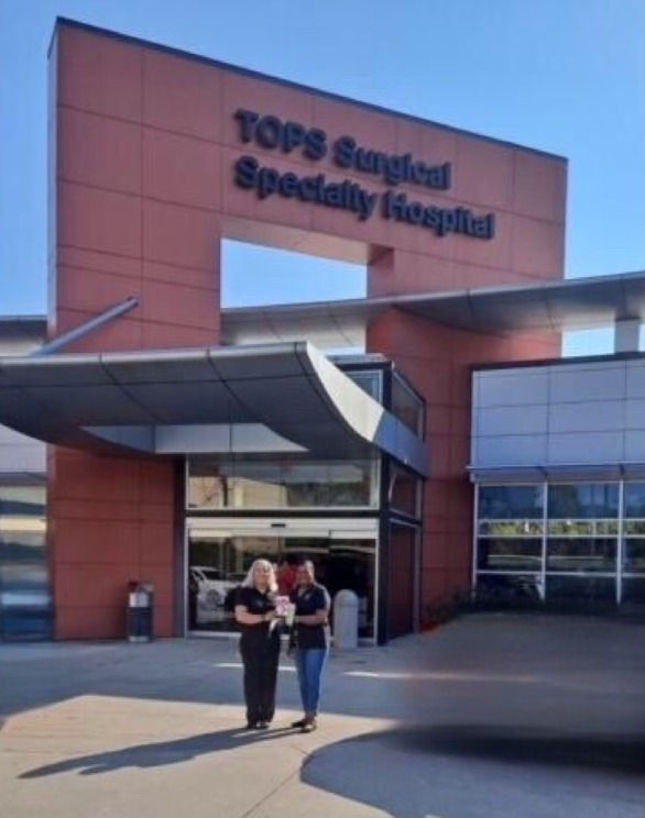 E.B.O.N.Y. Members Patrice Cenance and Kyrel Broxton at TOPS hospital