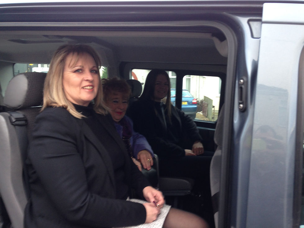 Wheel chair ladie with female family.JPG
