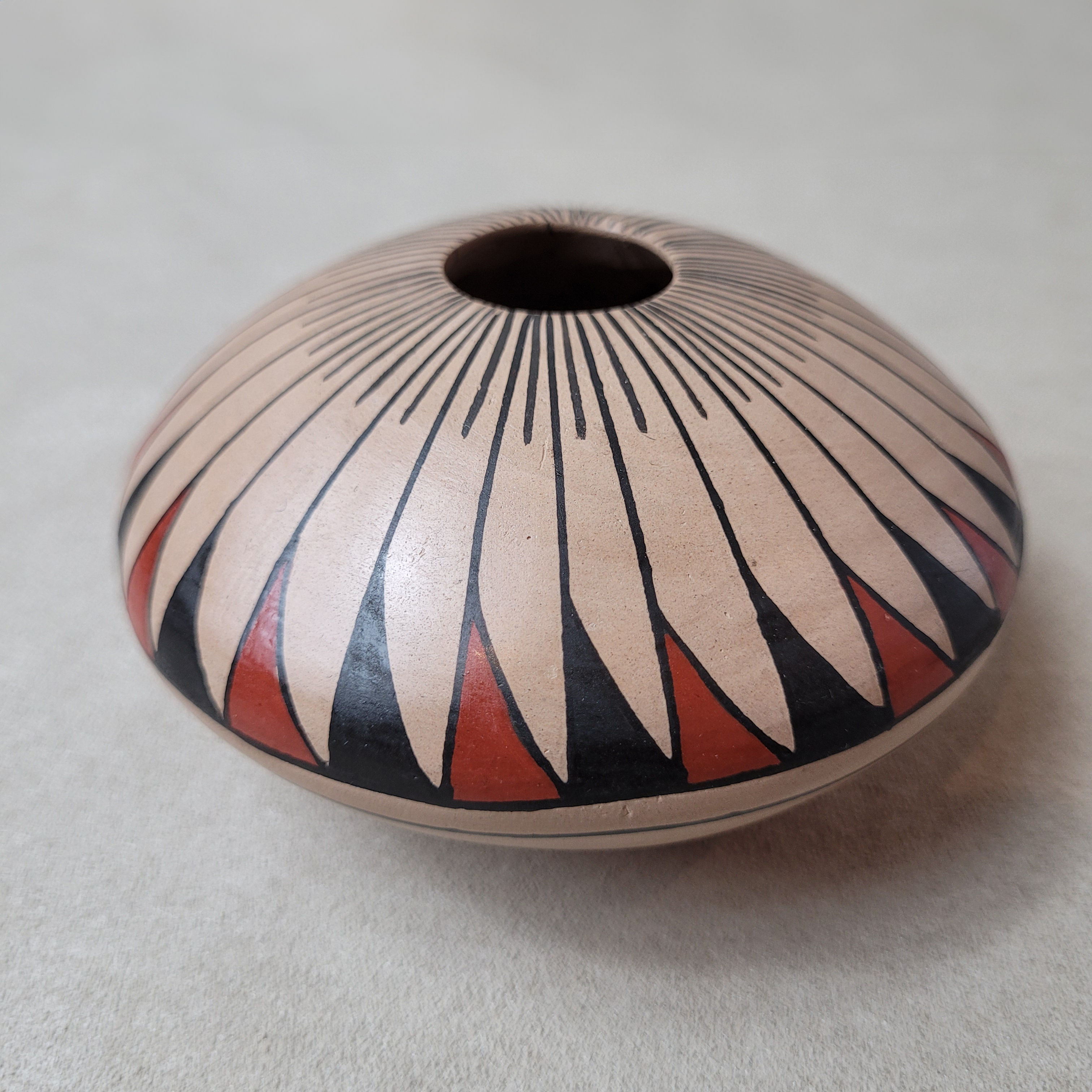 Medium Flat Tan, Red, & Black Mata Ortiz Seed Pot with Feather Motif