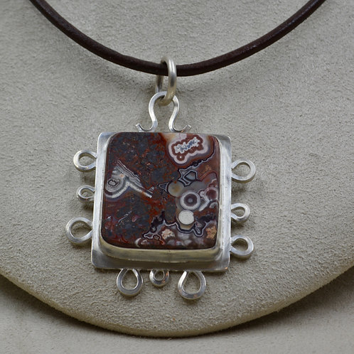 Crazy Lace Agate and Sterling Silver Pendant by Joe Glover