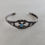 Thumbnail: Antique 1940's Fred Harvey Crossed Arrow Cuff With Blue Turquoise Dot
