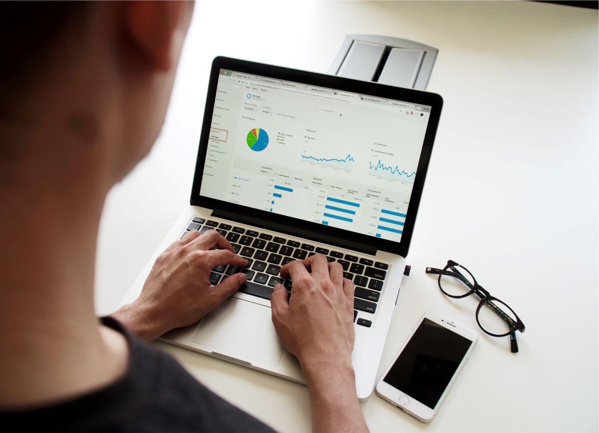 How to Level Up Your Business - computer showing performance graphs