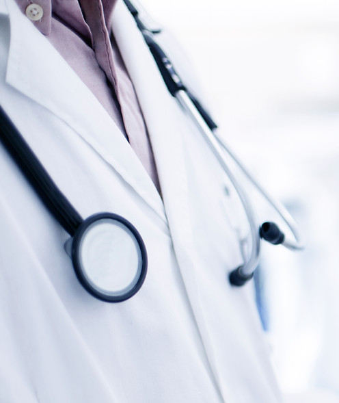 Doctor Using Digital Tablet