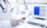Doctor Using Digital Tablet