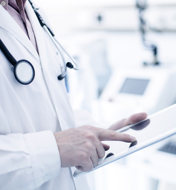 Doctor Using Tablet