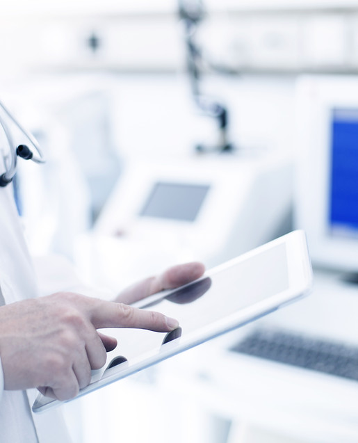 Doctor Using Digital Tablet