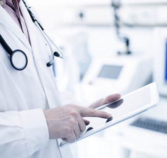 Doctor Using Digital Tablet