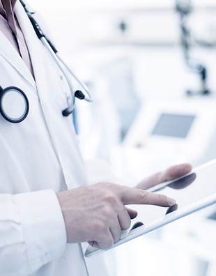 Doctor Using Digital Tablet