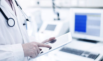 Doctor Using Digital Tablet