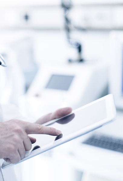 Doctor Using Digital Tablet