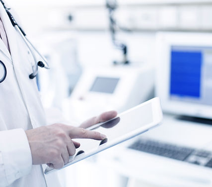 Doctor Using Digital Tablet