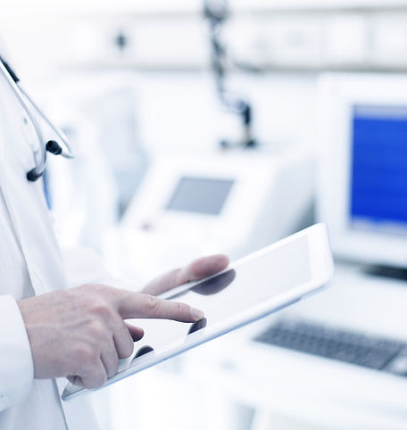 Doctor Using Digital Tablet