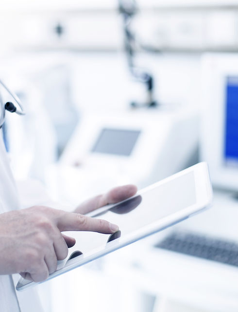 Doctor Using Digital Tablet