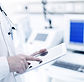 Doctor Using Digital Tablet