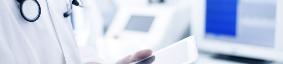 Doctor Using Digital Tablet