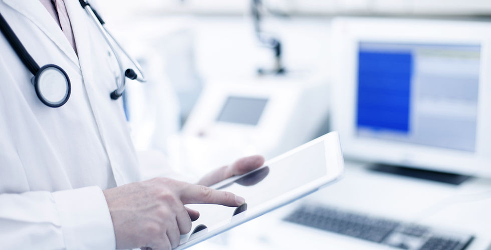 Doctor Using Digital Tablet