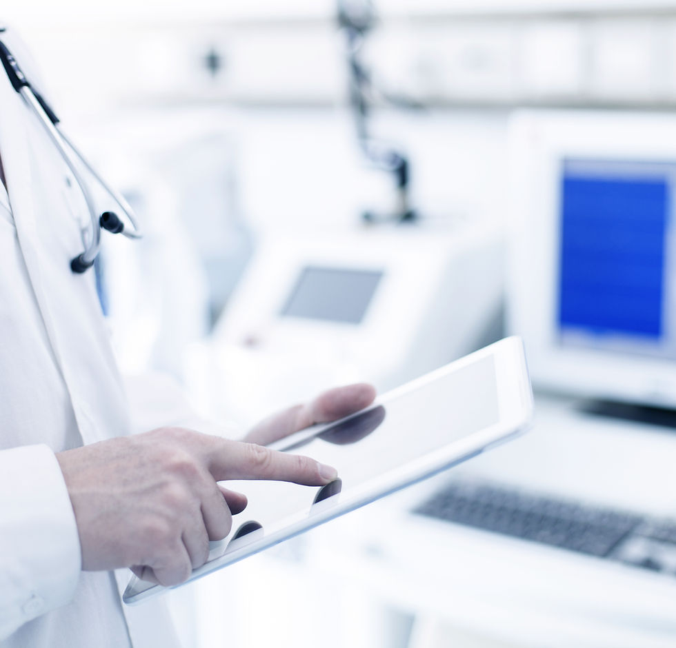 Doctor Using Digital Tablet