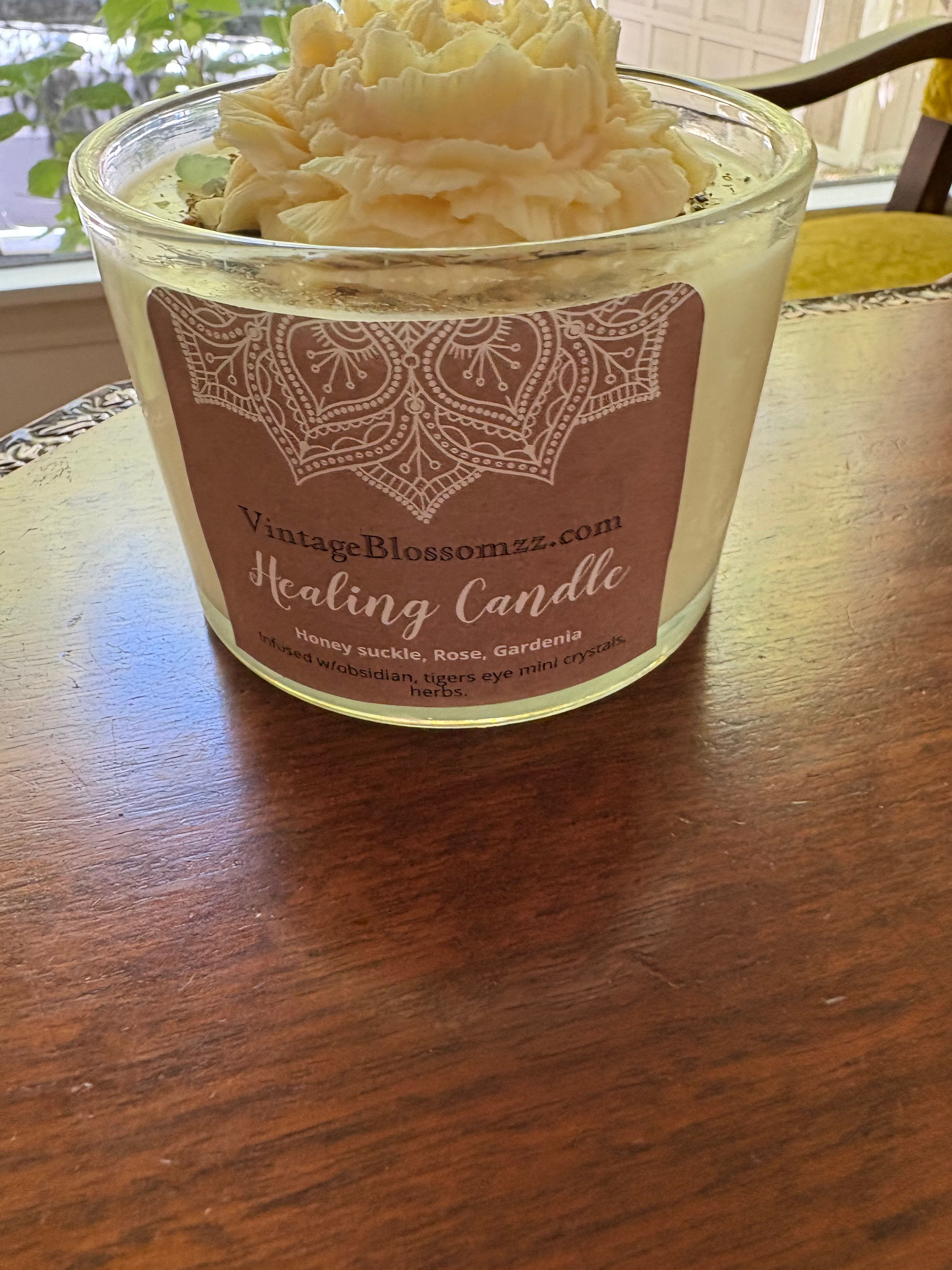 Healing Candle in glass jar on wooden table